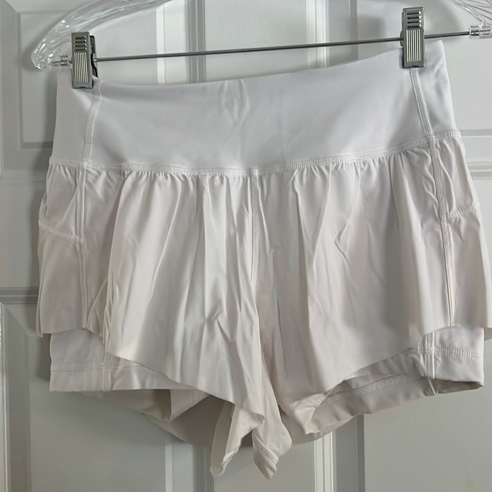 White athletic shirt with spandex lining. Lulu lemon